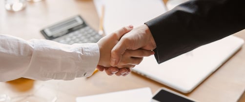 Closeup of business people shaking hands