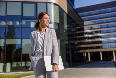Professional woman touring commercial office space