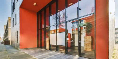 Outdoor view of a red colored commercial building