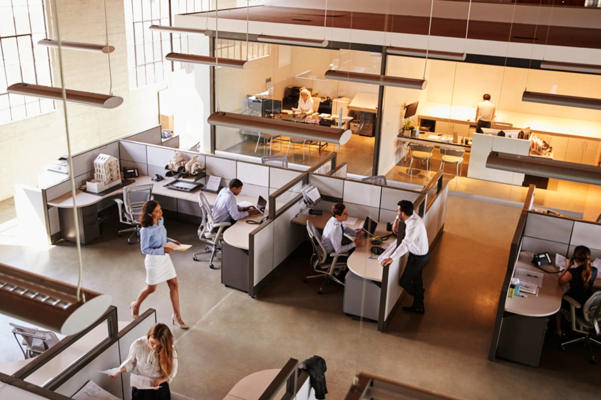 People in a busy office, property management techniques concept