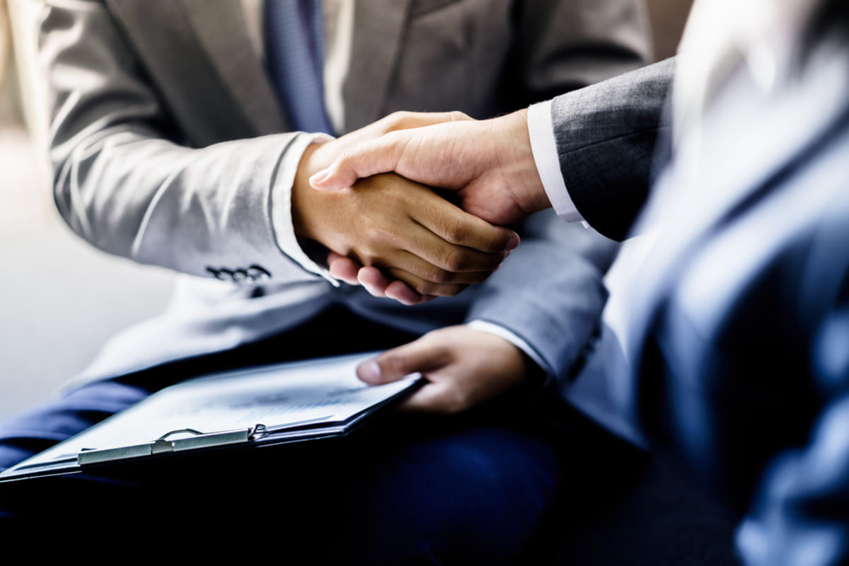 Two people shaking hands-1