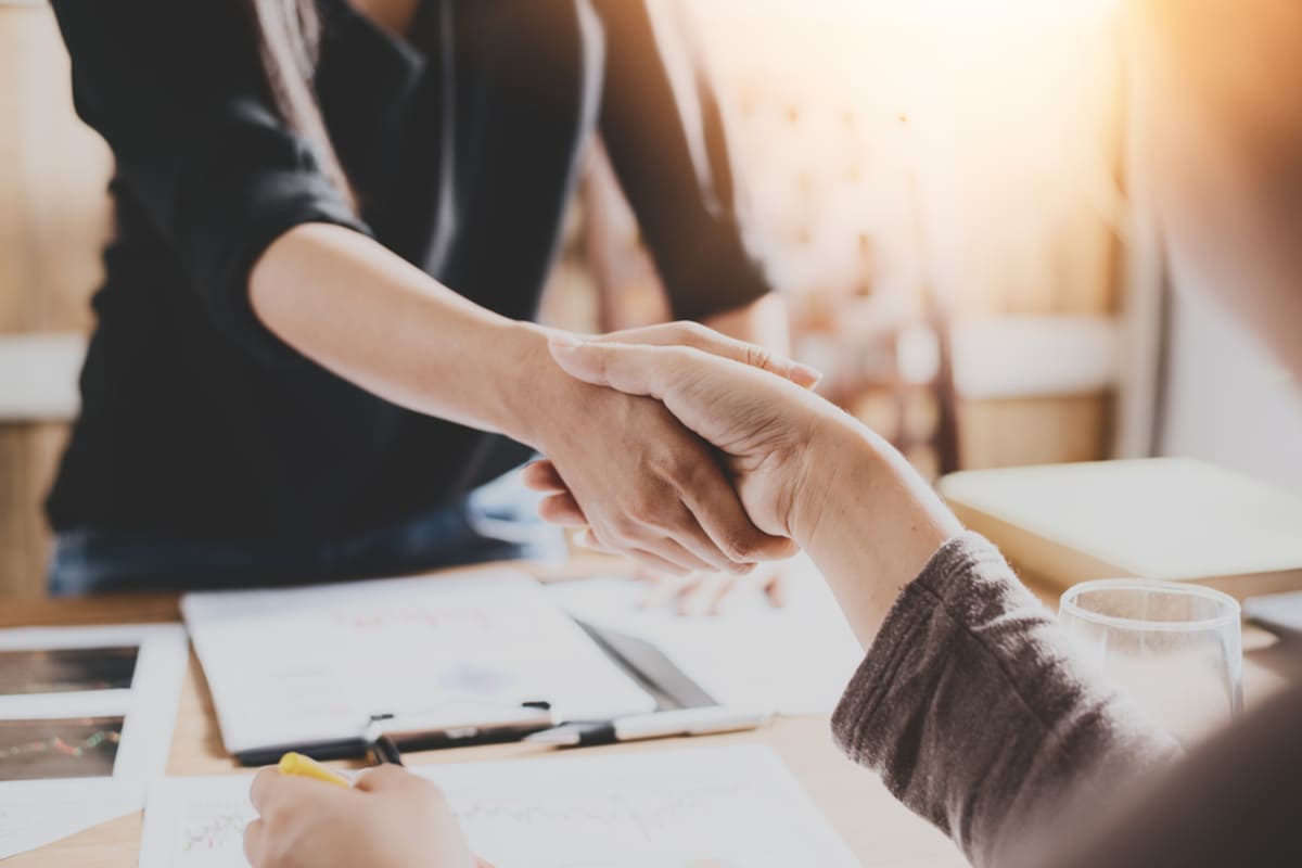 Two people shaking hands