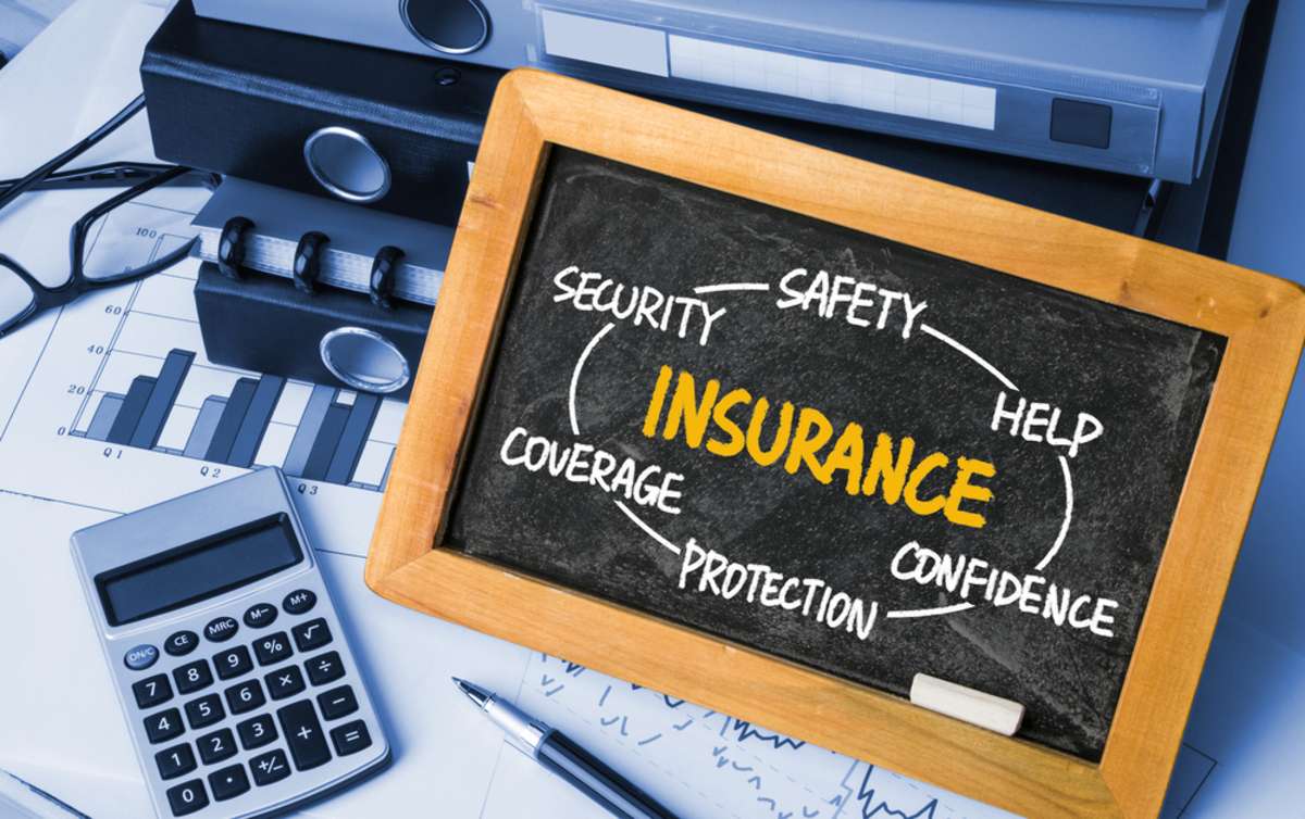 Insurance written on a blackboard, commercial tenant insurance concept