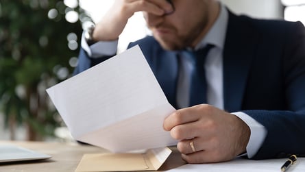 An sad investor, Baltimore commercial real estate loss concept.