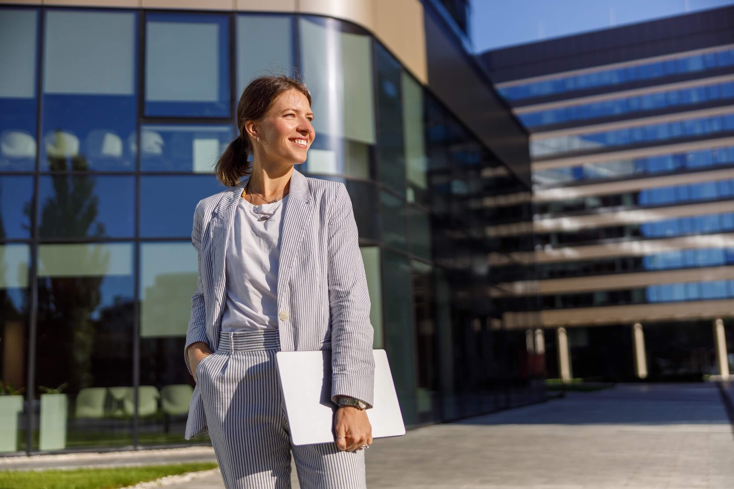 Professional woman touring commercial office space