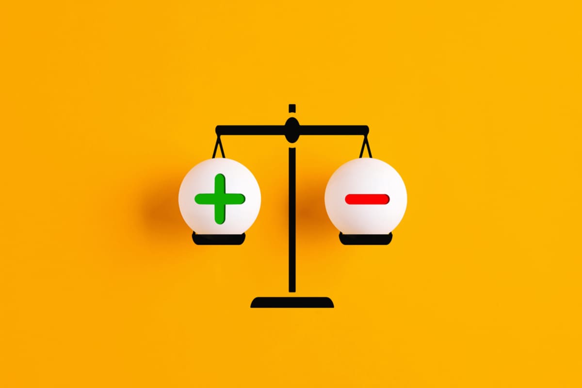 Positive and negative on a scale, deciding between single vs multi-tenant investments.