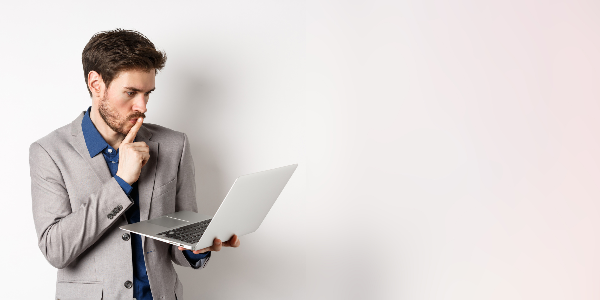 06 professional man thinking Holding Laptop